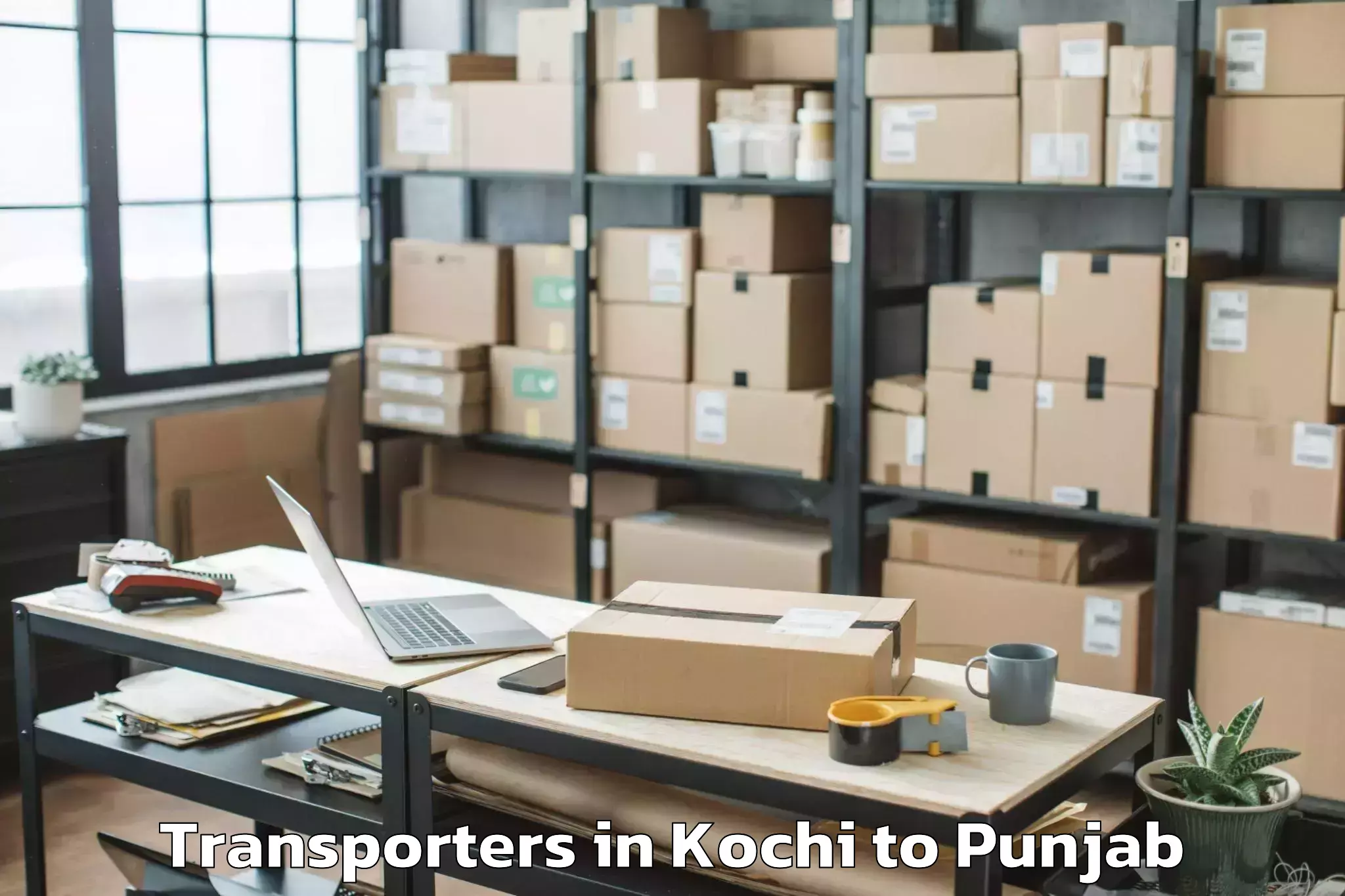 Book Kochi to Sri Guru Ram Das University Of Transporters Online